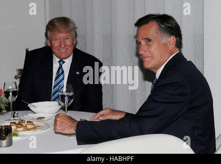 New York, USA. 29th Nov, 2016. United States President-elect Donald Trump sits at a table with former Governor Mitt Romney (Republican of Massachusetts) at Jean Georges Restaurant on November 29, 2016 in New York City. U.S. President-elect Donald Trump spent the afternoon holding meetings at Trump Tower as he continues to fill in key positions in his new administration. Credit: John Angelillo/Pool via CNP /MediaPunch Credit:  MediaPunch Inc/Alamy Live News Stock Photo