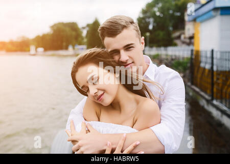 man and woman posing on the lake Stock Photo