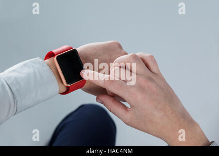 Woman using smart watch Stock Photo