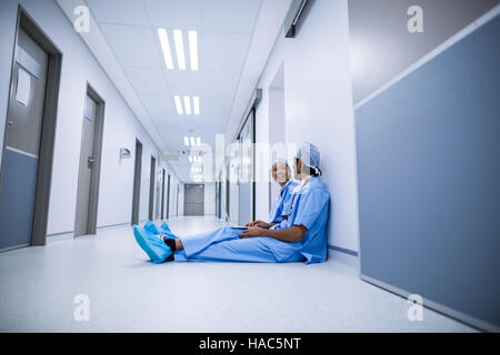 Surgeons using laptop Stock Photo