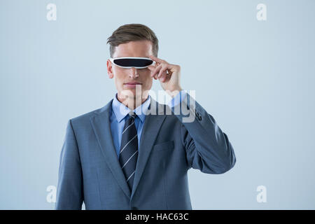 Businessman using virtual reality glasses Stock Photo
