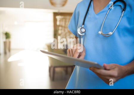 Doctors using digital tablet Stock Photo