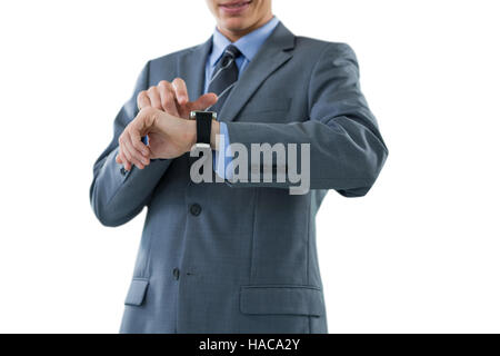 Businessman checking his smart watch Stock Photo