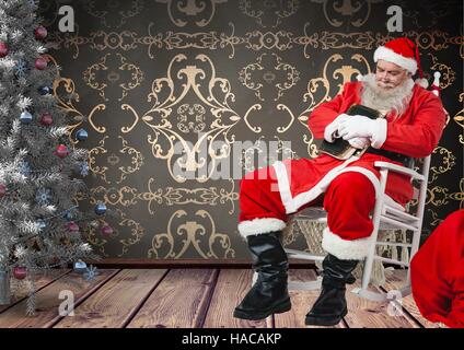 Santa taking a nap on rocking chair Stock Photo