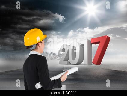 3D 2017 against a composite image of an engineer and road in sky Stock Photo