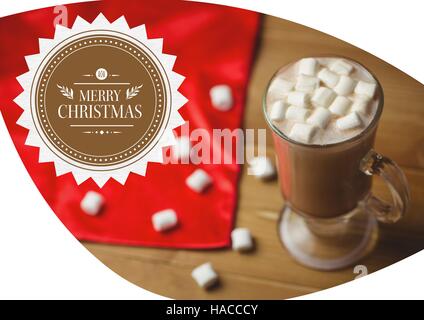Merry christmas greetings with coffee and marshmallow in glass Stock Photo