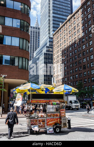 New York City,NY NYC Manhattan,Midtown,Third Avenue,street food,vendor vendors seller sell selling,stall stalls booth market marketplace,hot dog cart, Stock Photo