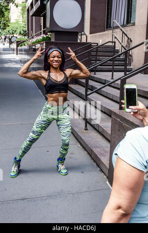 New York City,NY NYC,Manhattan,Midtown,Turtle Bay water,Second Avenue,Black Blacks African Africans ethnic minority,adult adults,woman women female la Stock Photo