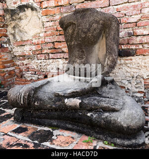 Detail of a headless Buddha at Wat Mahathat, Temple of the Great Relic, a Buddhist temple in Ayutthaya, Thailand Stock Photo