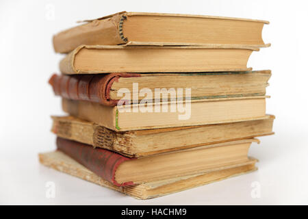 pile of old books isolated on white background Stock Photo