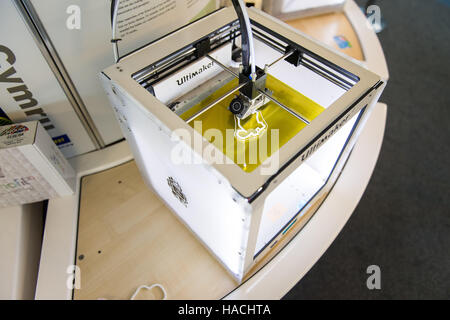 An "Ultimaker 2" 3D printer, in use printing a cookie cutter Stock Photo