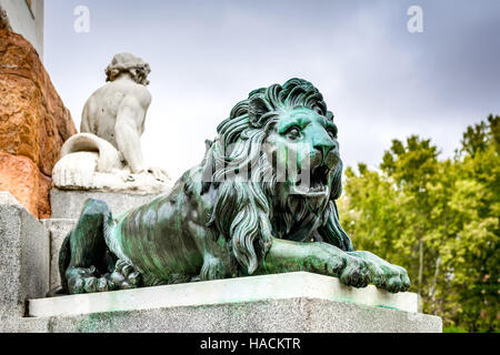 Madrid, Spain. Lion statue detail in Plaza de Oriente, in front of Royal Palace. Stock Photo