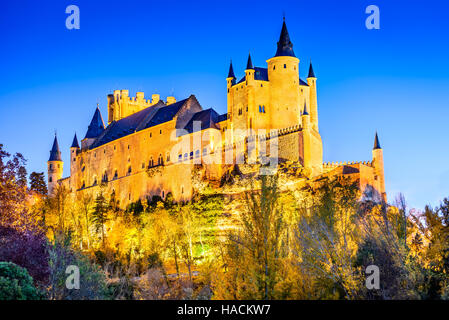 Segovia, Spain. Autumn dusk view of Castle of Segovia, known as Alcazar and built in 12th century in Castile and Leon. Stock Photo