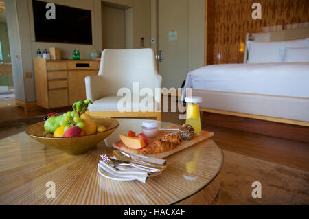 SINGAPORE - JULY 23rd, 2016: luxury Hotel room with modern interior, a comfortable bed and an awesome view of the Marina Bay Stock Photo