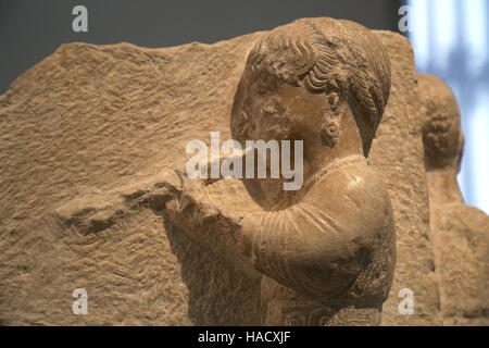 Auletris (aulos playing woman). Iberian relief of Osuna, Seville province, Spain. 3rd-2nd BCE. National Archaeological Museum, Madrid. Spain. Stock Photo