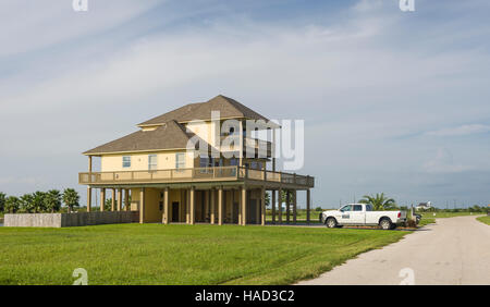 Stilt Houses and Beach, Bolivar Peninsula, TX. Crystal Beach is an Unincorporated community in the Bolivar Peninsula census-designated place, in Galveston County, Texas, United States. Stock Photo