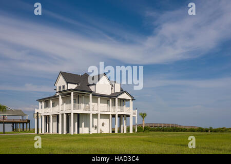 Stilt Houses and Beach, Bolivar Peninsula, TX. Crystal Beach is an Unincorporated community in the Bolivar Peninsula census-designated place, in Galveston County, Texas, United States. Stock Photo