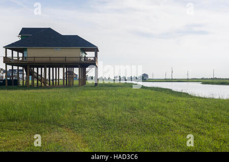 Stilt Houses and Beach, Bolivar Peninsula, TX. Crystal Beach is an Unincorporated community in the Bolivar Peninsula census-designated place, in Galveston County, Texas, United States. Stock Photo