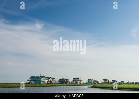 Stilt Houses and Beach, Bolivar Peninsula, TX. Crystal Beach is an Unincorporated community in the Bolivar Peninsula census-designated place, in Galveston County, Texas, United States. Stock Photo