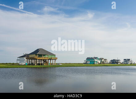 Stilt Houses and Beach, Bolivar Peninsula, TX. Crystal Beach is an Unincorporated community in the Bolivar Peninsula census-designated place, in Galveston County, Texas, United States. Stock Photo