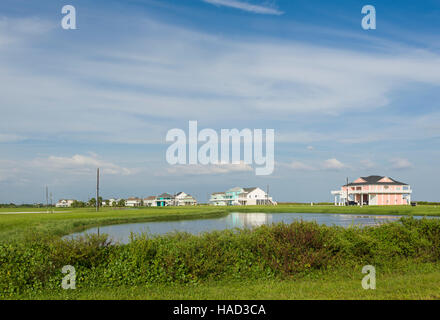 Stilt Houses and Beach, Bolivar Peninsula, TX. Crystal Beach is an Unincorporated community in the Bolivar Peninsula census-designated place, in Galveston County, Texas, United States. Stock Photo