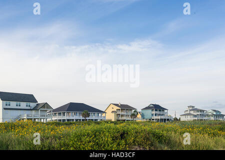 Stilt Houses and Beach, Bolivar Peninsula, TX. Crystal Beach is an Unincorporated community in the Bolivar Peninsula census-designated place, in Galveston County, Texas, United States. Stock Photo