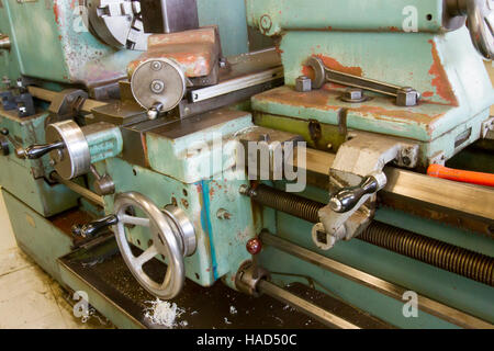 Close up on drill press tool in machine room. Stock Photo