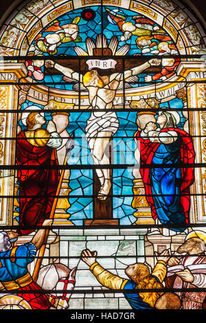 England, London, The City, Church of St Botolph-without-Bishopgate, Stained Glass Window depicting Christ on The Cross Stock Photo