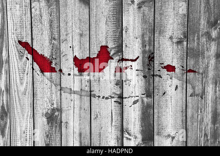 Map and flag of Indonesia on weathered wood Stock Photo