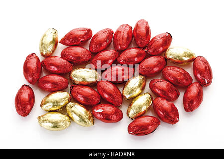 Chocolate eggs in colored aluminum foil Stock Photo