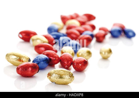 Chocolate eggs in colored aluminum foil Stock Photo