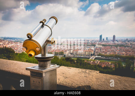 Telescope directed towards the city of Lyon in France Stock Photo