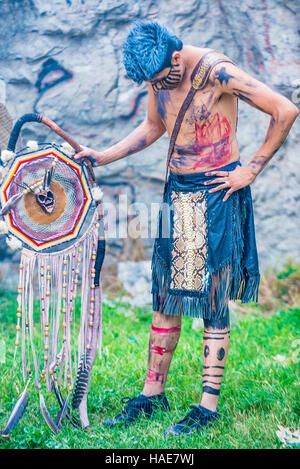 Native American with traditional costume participates at the festival of Valle del Maiz in San Miguel de Allende ,Mexico. Stock Photo