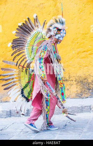 Native American with traditional costume participates at the festival of Valle del Maiz in San Miguel de Allende ,Mexico. Stock Photo