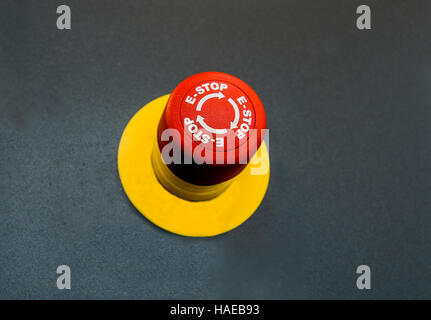 Emergency button on black isolated background. stop button Stock Photo