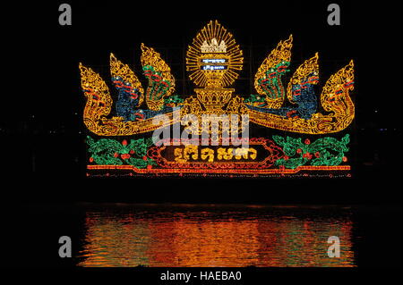 an Illuminated float casts its reflection on the Tonle Sap river during The Water Festival, Phnom Penh, Cambodia. © Kraig Lieb Stock Photo