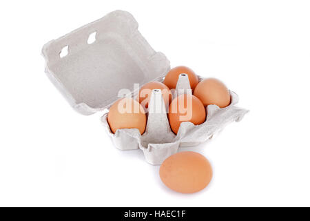 Half dozen  brown chicken eggs in box  isolated on white background Stock Photo