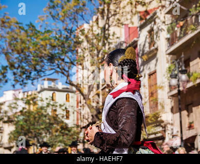 Woman in local costume,perform a traditional dance on Plaza del Mercado (Placa del Mercat),Valencia Stock Photo