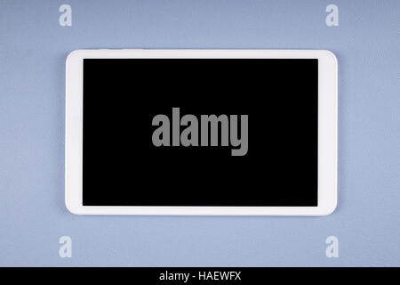 white tablet computer with blank screen on desk Stock Photo