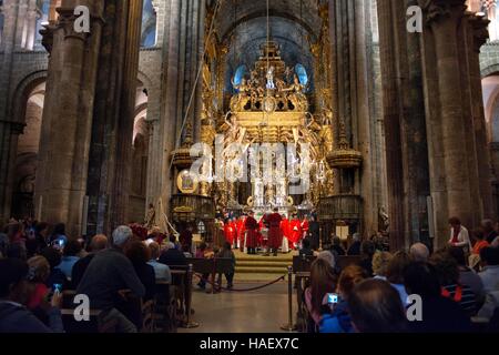 Botafumeiro ceremony in the Cathedral of Santiago de Compostela, A Coruña, Spain. The last stop of the Transcantabrico Gran Lujo luxury train. Stock Photo