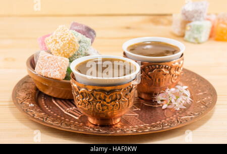 Coffee and Turkish delight in a copper kitchen utensils Stock Photo