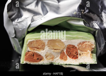 Almond Torrone covered with lemon chocolate Stock Photo