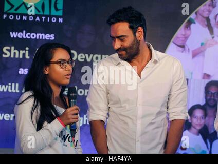 Bollywood actor Ajay Devgn daughter Nysa press conference of Smile Foundation announce new campaign She Can Fly Mumbai Stock Photo