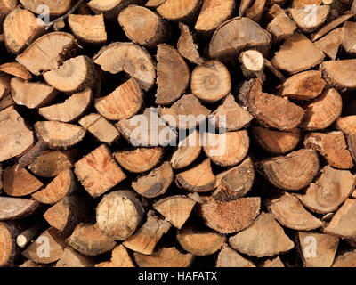 Stacked firewood supply background texture Stock Photo