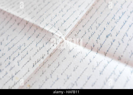 handwritten text on folded paper - old mail / letter Stock Photo