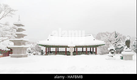 Buddhist temple covered with snow in winter in South Korea Stock Photo