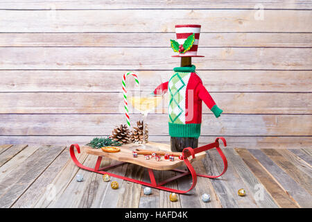 Glass of white wine with Christmas decorations Stock Photo