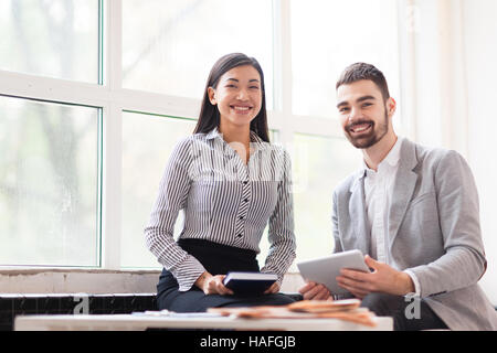 Succesful entrepreneurs having meeting in cafe Stock Photo