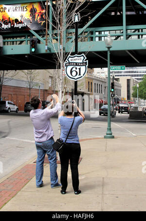 Tourists taking a photo of Route 61 sign (Memphis Blues Trail) in Memphis, Tennessee Stock Photo