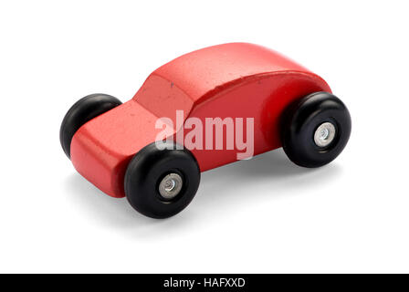 Red wooden toy car on white background with natural shadow Stock Photo